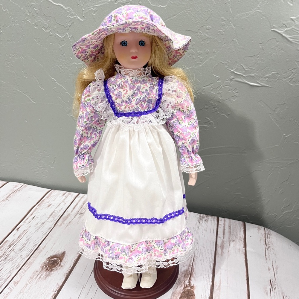 Porcelain Doll with‎ purple floral dress and Hat vintage